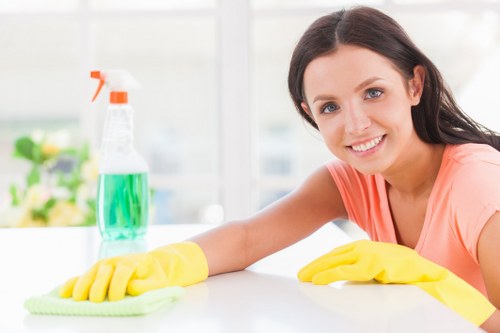 Airbnb cleaner preparing a guest-ready apartment in SW10
