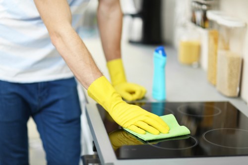 Cleaner maintaining a tidy SW10 home with a regular cleaning routine